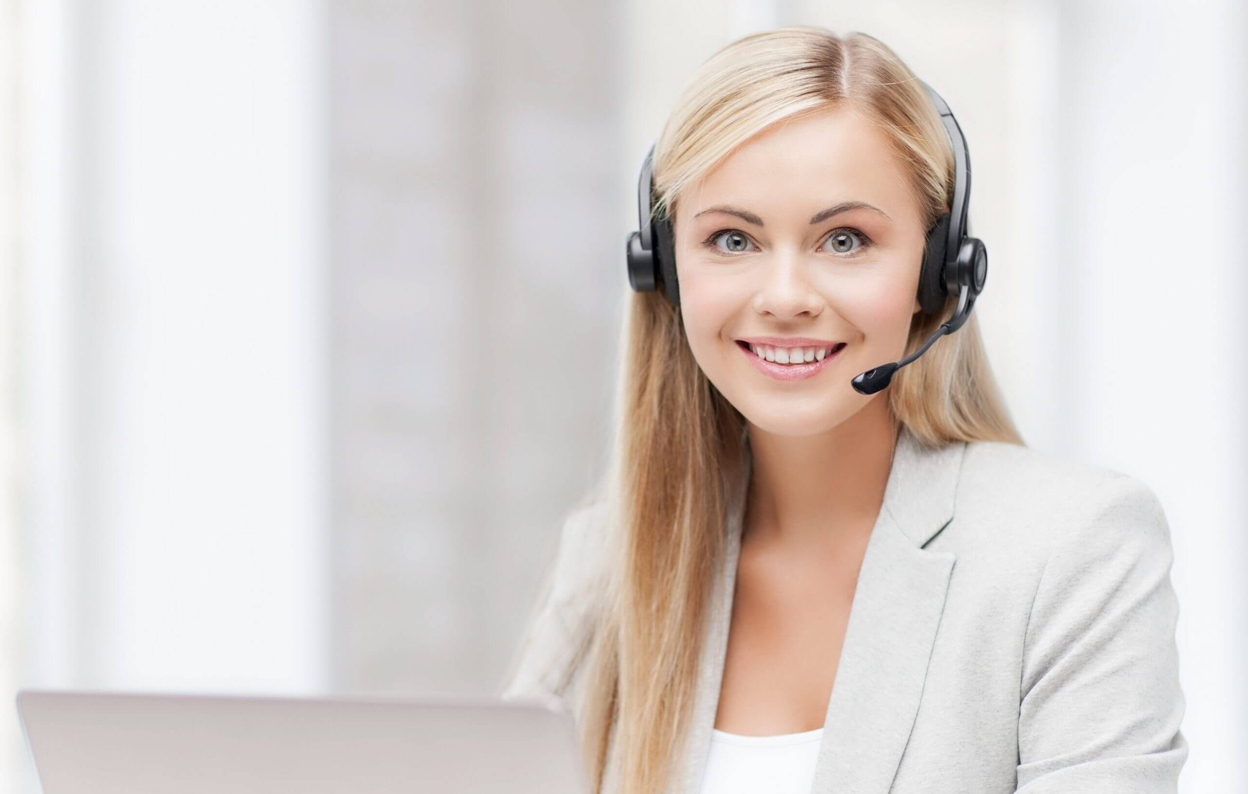 Girl with headset scaled - Top 15 Ways The Real Estate Industry Uses Virtual Assistants